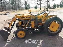 1960 International Cub Lo Boy Tractor with 2 loader buckets and belly mower