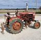 1962 Farmall 140 tractor with IH 144 three shank cultivators