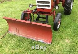 1963 International Harvester 140 Tractor & Hydraulic Snow Plow & Chains