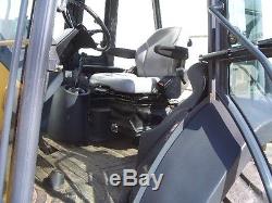 2005 John Deere 310G tractor skip loader