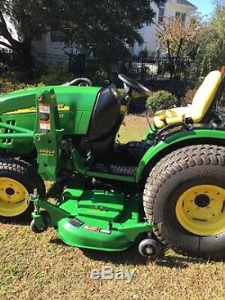 2011 John Deere 2520 tractor with 200CX loader and 62D mower deck. 58.5 hours