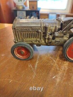 Antique 7.5 Arcade Cast Iron McCormick-Deering Farm Tractor With Driver