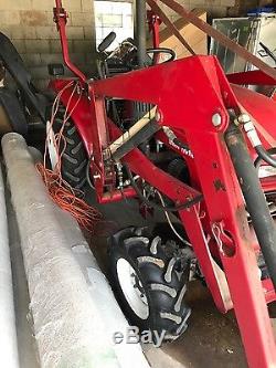 Compact tractor, loader cutter, 4wd comes with brandnew motor 1 yr warrenty