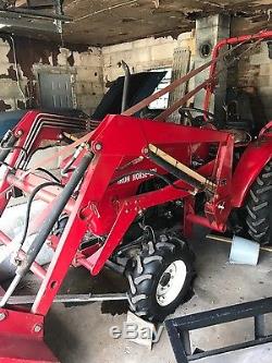 Compact tractor, loader cutter, 4wd did run but leaks oil between trans motor