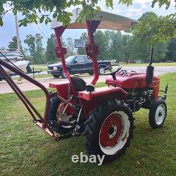 Farm Pro Tractor 2420 2 wheel drive with boom box blade plow used diesel motor
