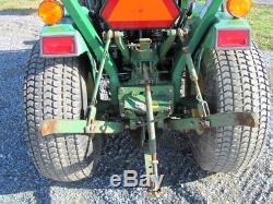 JOHN DEERE 770 COMPACT TRACTOR With 70 LOADER. 4X4. SHOWING 990 HRS. RUNS GREAT