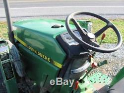 JOHN DEERE 770 COMPACT TRACTOR With 70 LOADER. 4X4. SHOWING 990 HRS. RUNS GREAT