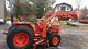 Kubota L2550 4X4 with front Loader and mid 60 inch mower