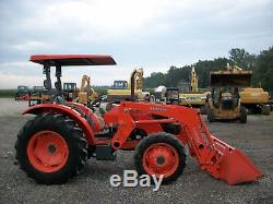 Kubota M6040 tractor with Front Loader, 4WD, Shuttle Shift, 2 remotes, 1,175 hours