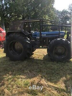 New Holland 8010 4x4. Dual Remotes. 100 Horsepower. Hydraulic Winch. Excellent