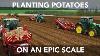 Six John Deere Tractors Planting Potatoes