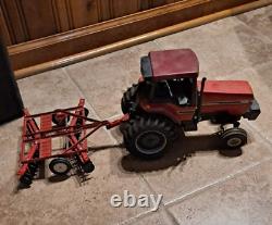 Vintage 8 Inch Ertl Farmall Tractor with Ertl Plow