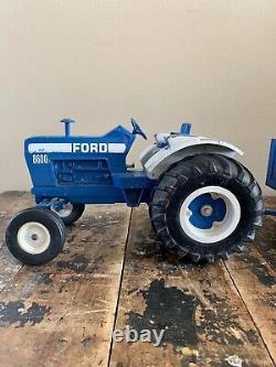 Vintage ETRL Ford 8600 112 Scale Diecast Farm Tractor and the big Blue Trailer