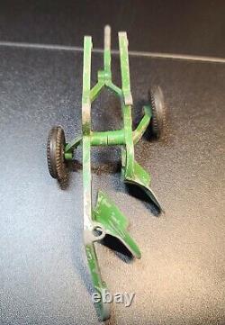 Vintage toy tractor farm plow quality control reference Tru Toy scale, green
